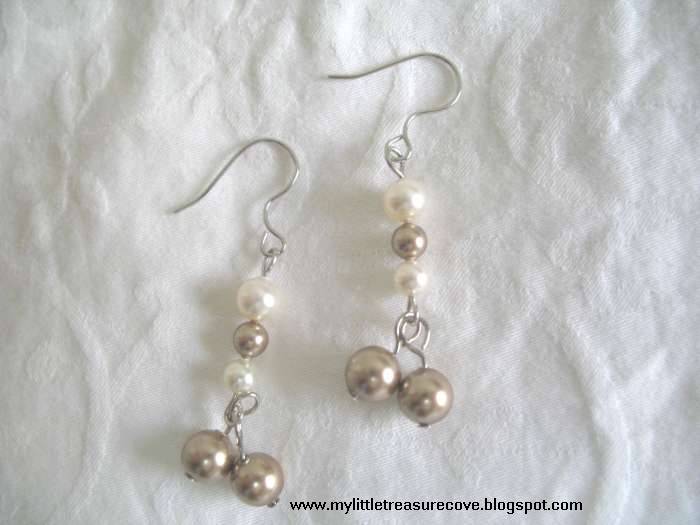 [Cream+with+two+dangling+bronze+pearl+earrings.jpg]