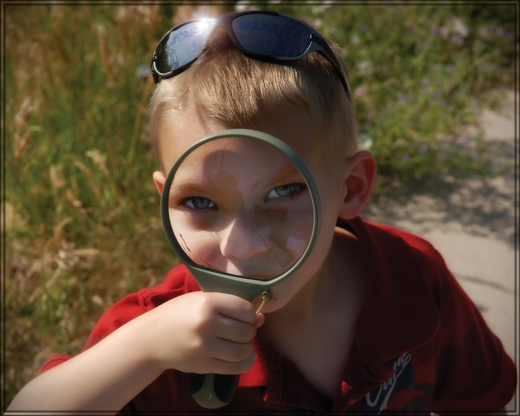 [william+looking+at+camera+through+magnifying+glass.jpg]