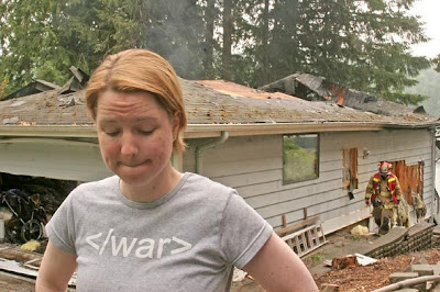 Darcy Burner outside her home which has just burned down. July 1, 2008. photo Ellen M. Banner/The Seattle Times.