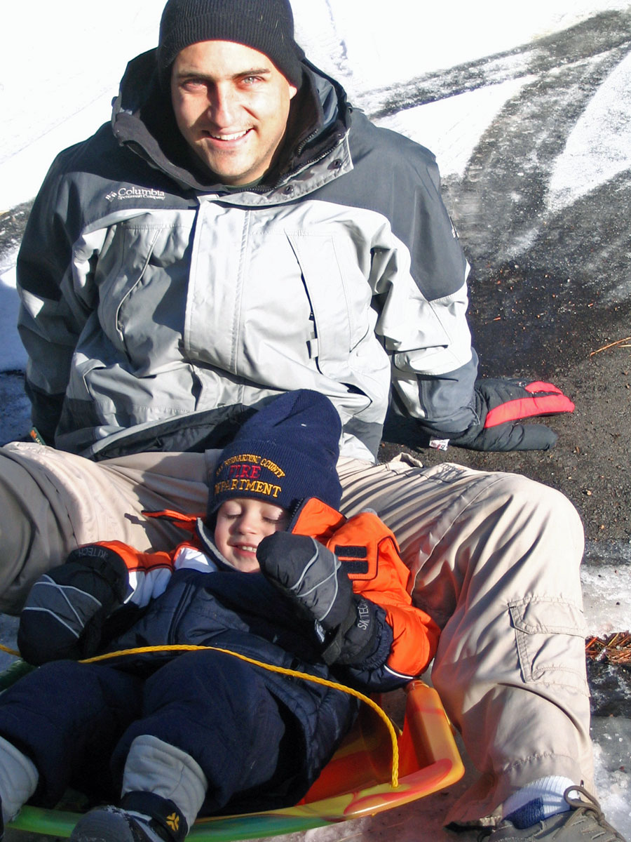 [dad-and-caiden-sled.jpg]