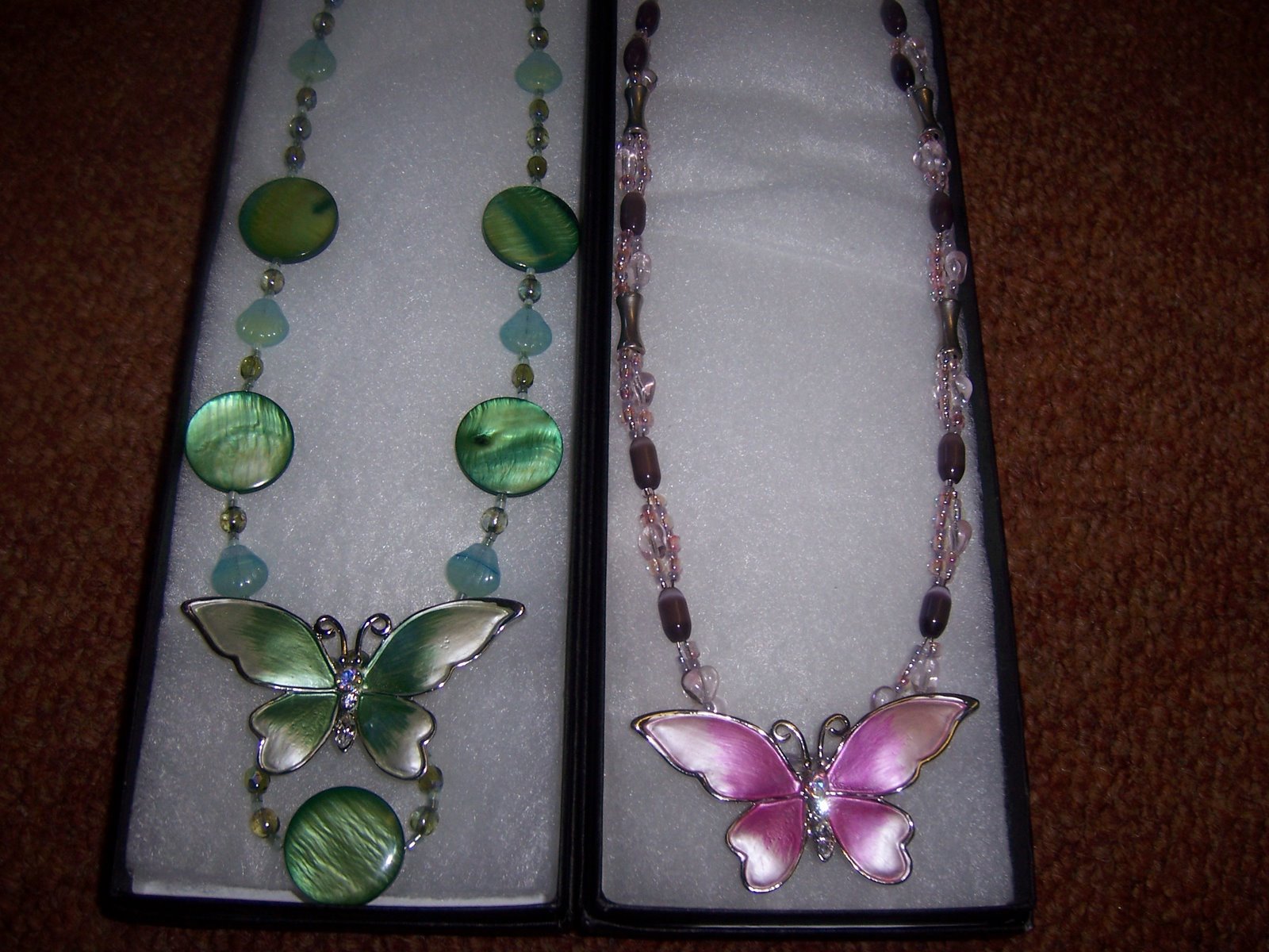 Beautiful butterfly pendant necklace with Swarovski crystals and delicate shell beads (pink/green).