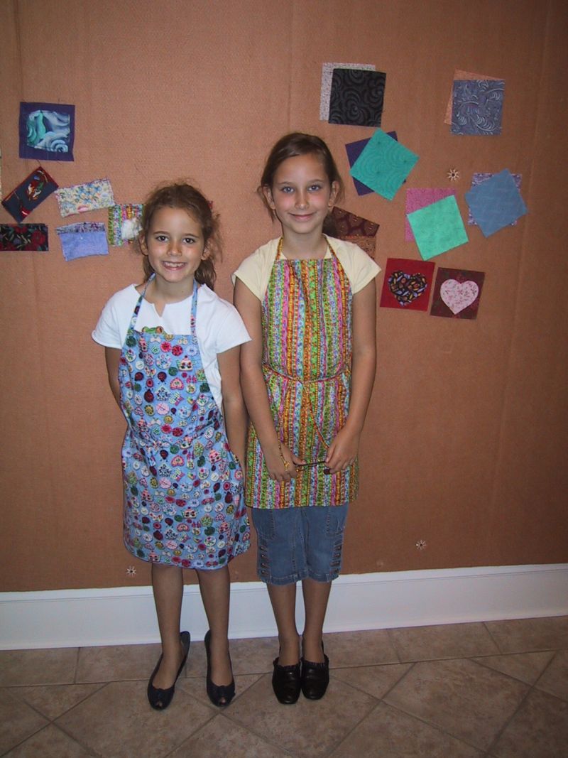[Caitie+and+Alex+modeling+their+aprons.jpg]