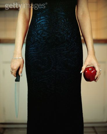 [Woman+wearing+evening+gown,+carrying+applo+and+knife,+mid+section+-+David+Stuart.jpg]
