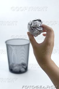 [hand-throwing-crumpled-paper-into-dustbin-~-ispi037009.jpg]