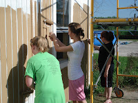 The ladies painted the whole 2-story house in just a couple of days - way to go!