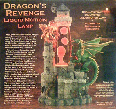 Lava lamp built into a castle with two dragons climbing on it 