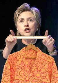 Collaged image of Hillary Clinton holding orange pajamas