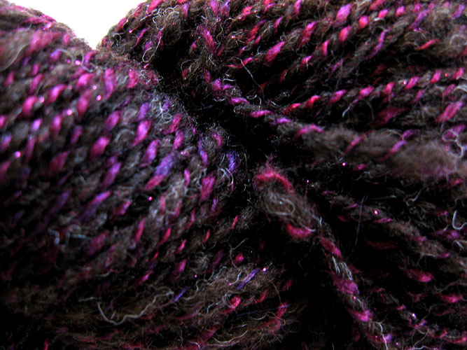 Gray wool and magenta silk yarn