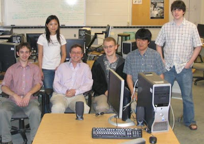 Jim Fruchterman and five students in a lab setting with computers 