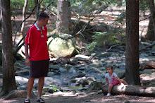 Daddy and E-Beth hanging out near the river