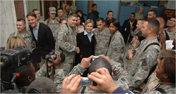 [bayh_and_clinton_with_troops.jpg]