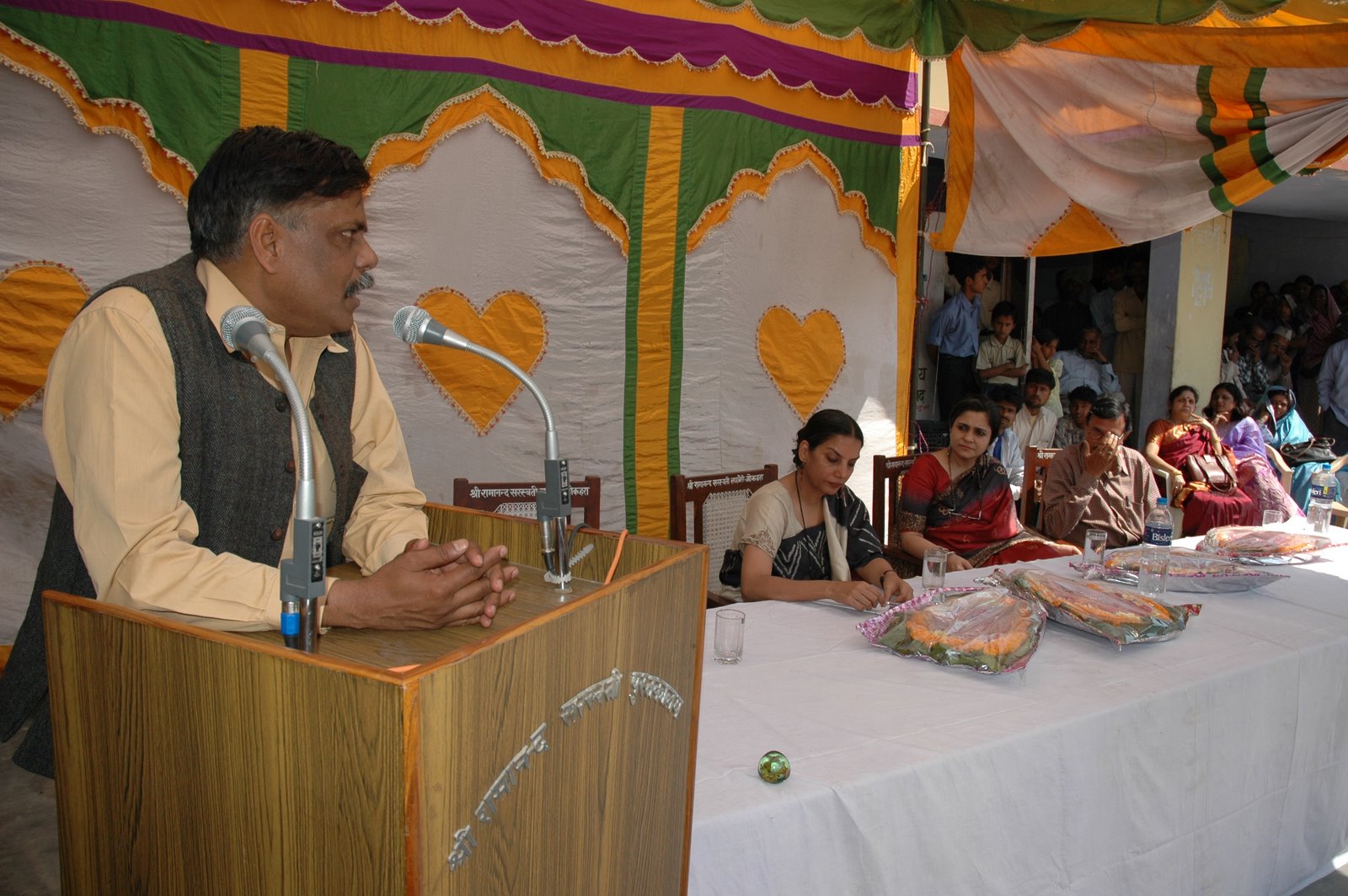 Vibhuti Narain Rai addressing a gathering in the library established by him in his village
