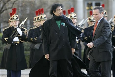 [Muamar+Khadaffi.jpg]
