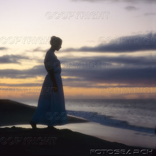 [woman+on+beach+sunrise.jpg]