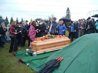 The graveside funeral, with Autumn's father Paul, Autumn's sister Bernadette, and Autumn's aunt and uncle, John & Suzie.