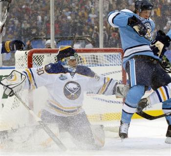 Winter Classic: Sidney Crosby, right, screens Buffalo Sabres goalie Ryan Miller, left, prior to Pens' Colby Armstrong's goal