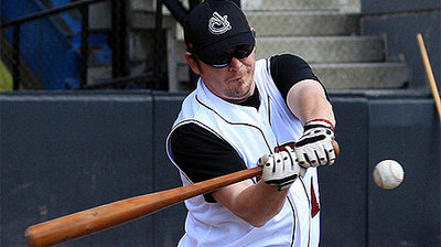 Theo Fleury takes batting practice with Calgary Vipers