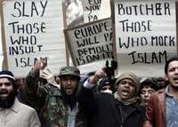 [muslim+signs+protesters.jpg]