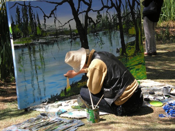 [Man+painting+view+of+the+lake.JPG]