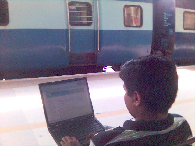 [Browsing_at_Trivandrum_Railway_Station_India_2006.jpg]