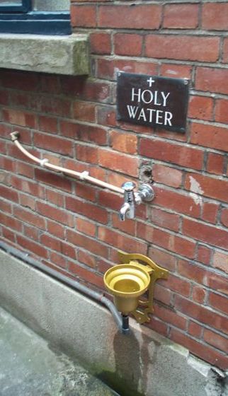 [398px-Holy_water_St_Teresa's_church_Clarendon_Street_Dublin_2006_Kaihsu_Tai.jpg]
