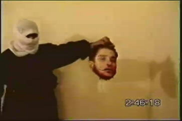 [Nick Berg Beheading Pic 9 - WARNING GRAPHIC!!.jpg]