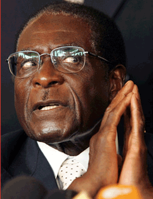 [Mugabe+-+mãos+postas.gif]