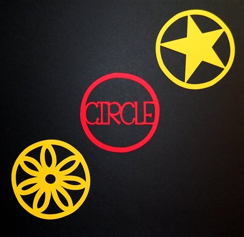 [flower+star+and+circle+on+black.jpg]