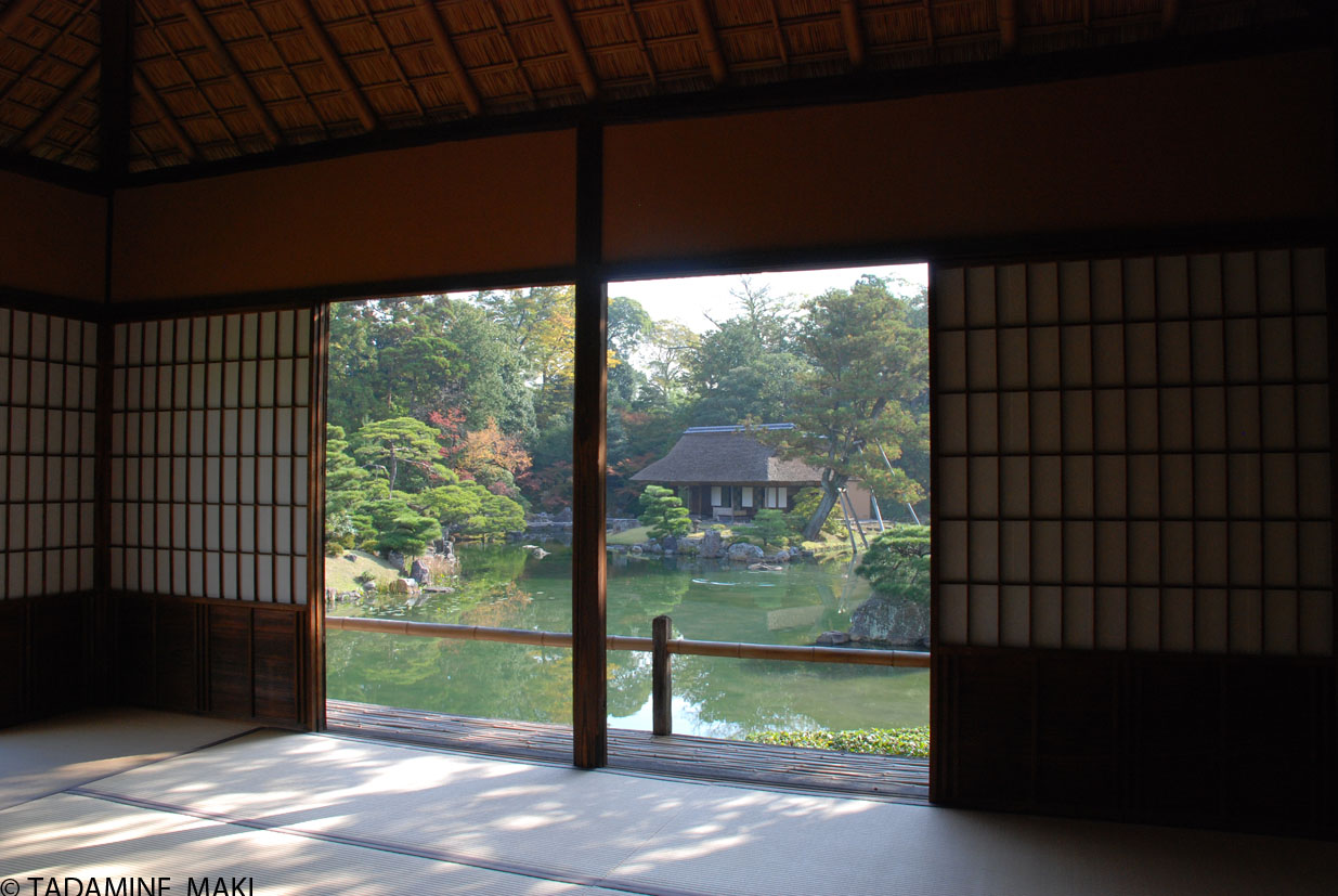 A pond and a rustic house seen from the inside, at Katsura Imperial Villa, in Kyoto