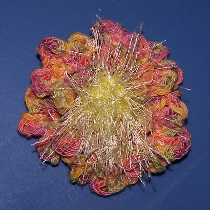 [crochet+flower+-+rainbow+with+yellow+center.jpg]