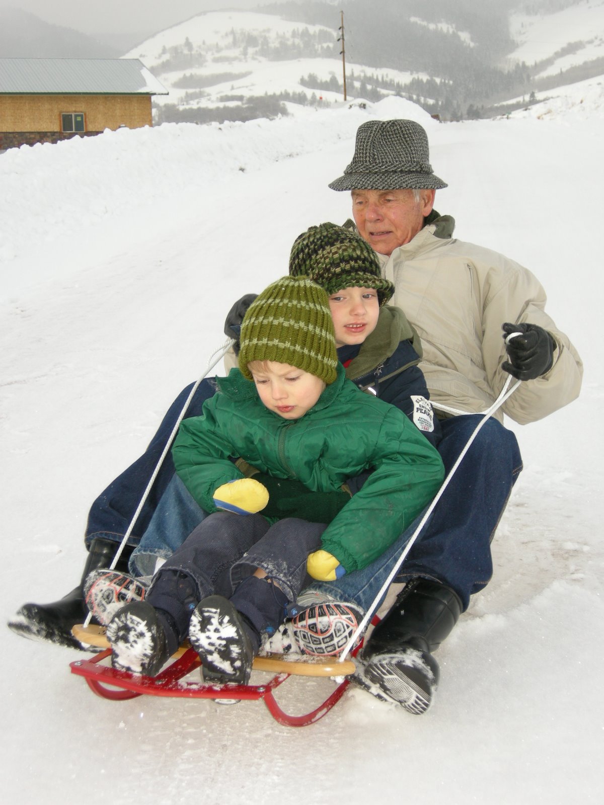 [Dad+w+kids+sled+2.jpg]