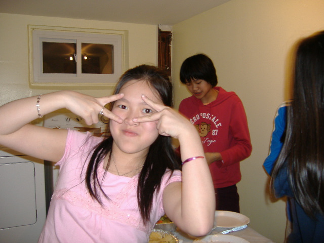 [emily+with+the+peace+sign.jpg]