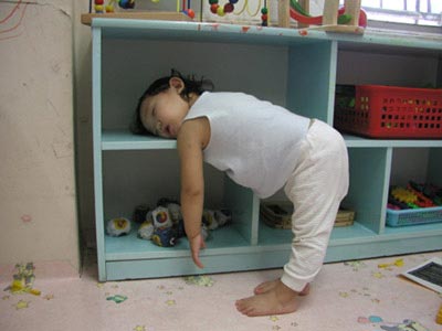 [Toddler+asleep+leaning+on+shelf.jpg]