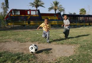 [Baghdadi+boys+play+soccer.jpg]