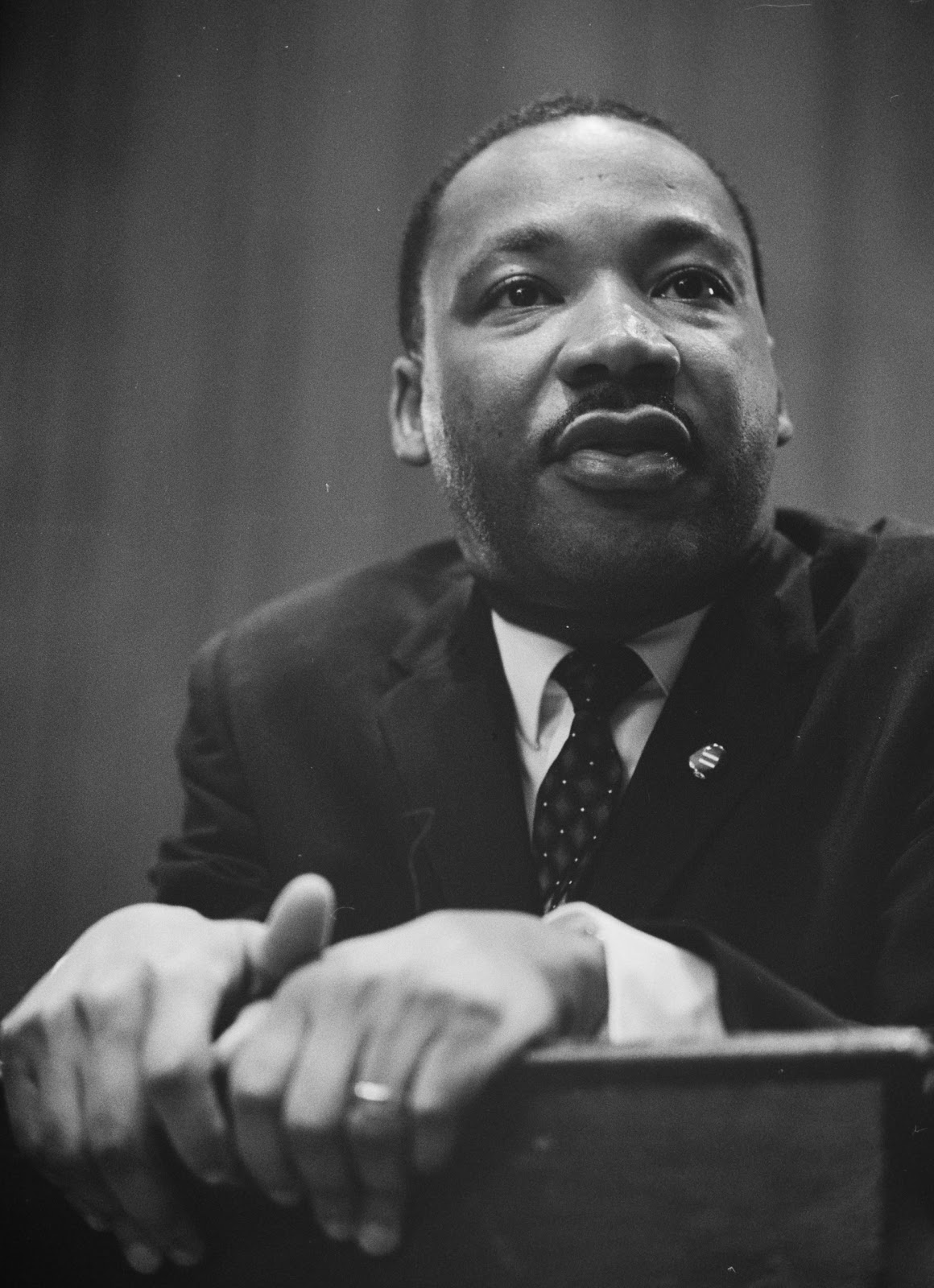[Martin-Luther-King-1964-leaning-on-a-lectern.jpg]