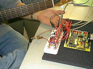 Real-Time Digital Guitar Tuner using Microcontroller AVR AT90S8535