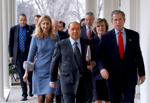 [Silvio_Berlusconi_and_George_W._Bush,_walking_along_the_White_House.jpg]