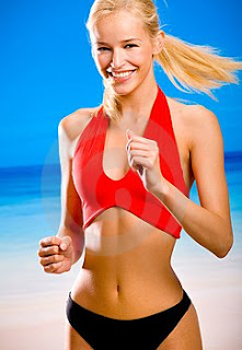 picture of pretty pony-tailed and smiling blonde woman running, wearing a red sports bra, on a blue background